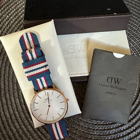 Daniel Wellington Other - Daniel Wellington Rose Gold watch on red/blue/white grosgrain band, GD1014